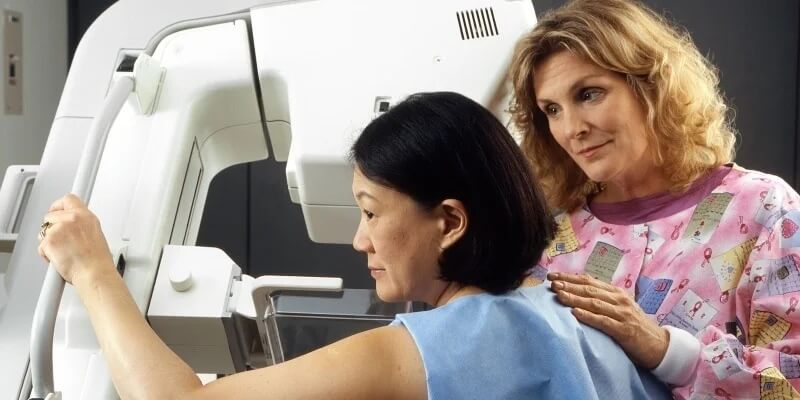 2021-05-29 How To Carry On Despite Poor Health Woman having a mamogram